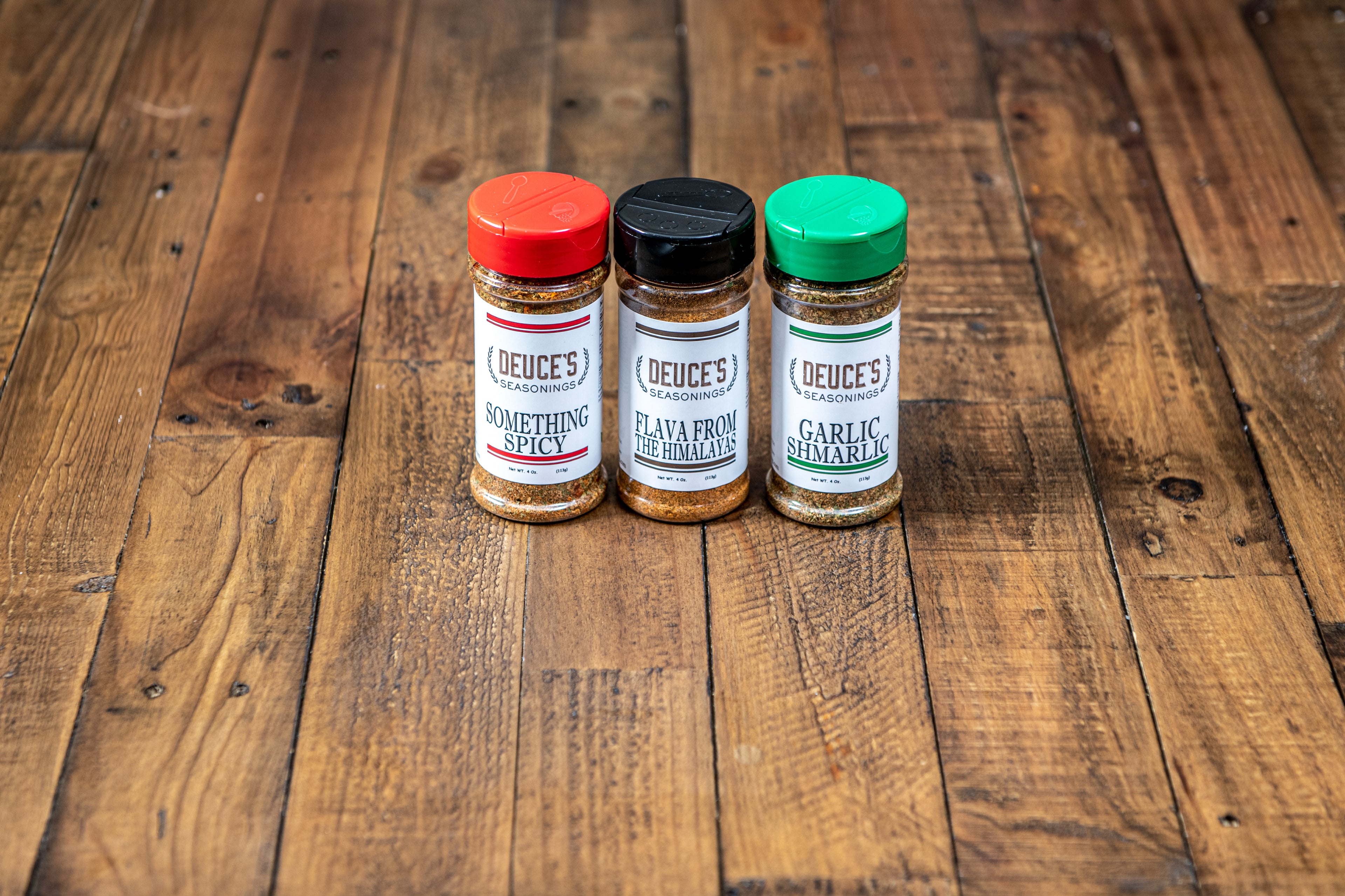 Image of Black Owned Healthy Seasonings On Wood Floor 